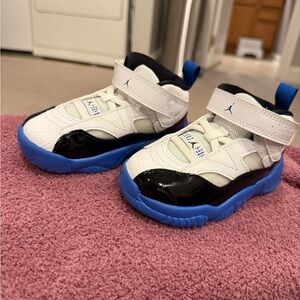 Jordan Kids White and Black Sneakers with Blue Accents
